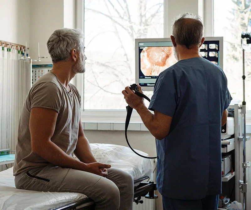 Man reviewing colonoscopy results