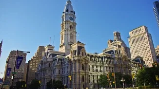 Philadelphia City Hall clock tower and downtown skyline on a clear day representing personal injury law in Pennsylvania